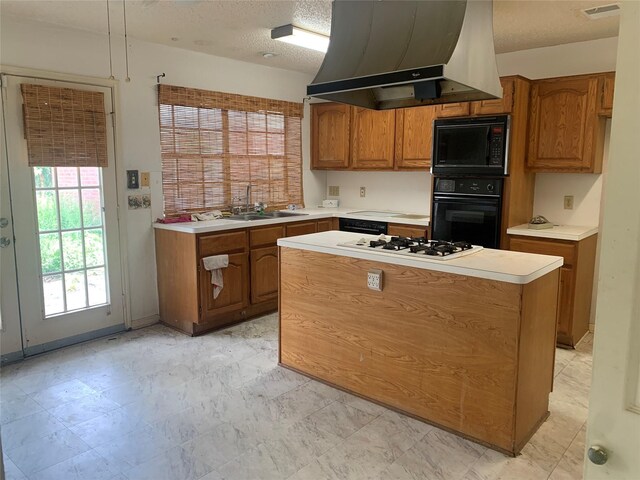 3027 Country Club Blvd, Sugar Land, TX 77478 - kitchen with black appliances, range hood, brown cabinetry, light countertops, and a textured ceiling