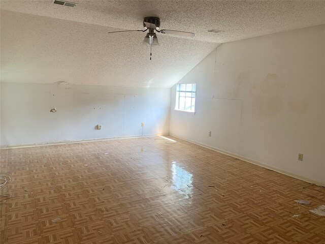3027 Country Club Blvd, Sugar Land, TX 77478 - spare room with a textured ceiling, a ceiling fan, and lofted ceiling