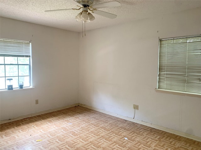 3027 Country Club Blvd, Sugar Land, TX 77478 - empty room featuring a textured ceiling and ceiling fan