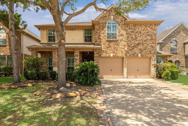 26314 Planters Heath, Katy, TX 77494 - traditional home featuring concrete driveway, a garage, and brick siding