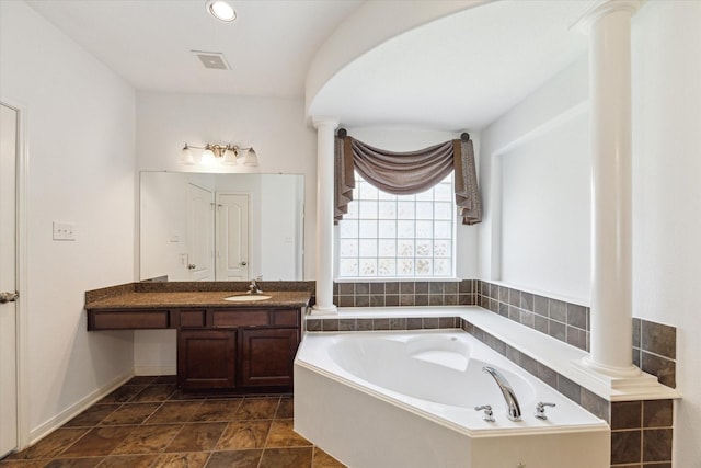 26314 Planters Heath, Katy, TX 77494 - bathroom with ornate columns, a bath, vanity, and recessed lighting