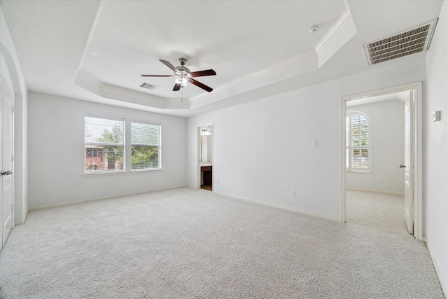 26314 Planters Heath, Katy, TX 77494 - spare room with a tray ceiling, plenty of natural light, a ceiling fan, carpet flooring, and ornamental molding