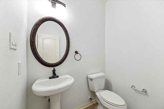 26314 Planters Heath, Katy, TX 77494 - half bathroom with toilet and baseboards