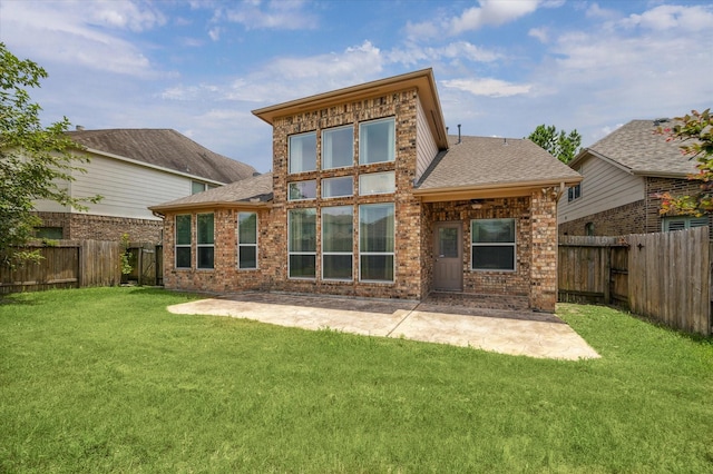 26314 Planters Heath, Katy, TX 77494 - back of property featuring a fenced backyard, a shingled roof, ceiling fan, and a patio
