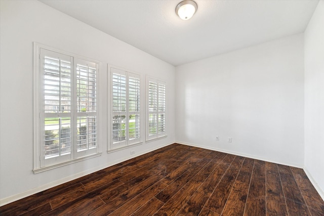 26314 Planters Heath, Katy, TX 77494 - unfurnished room with dark wood-style floors and baseboards