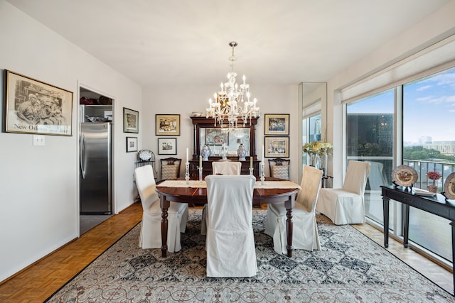 2200 Willowick Rd Unit 7B, Houston, TX 77027 - dining area featuring a chandelier