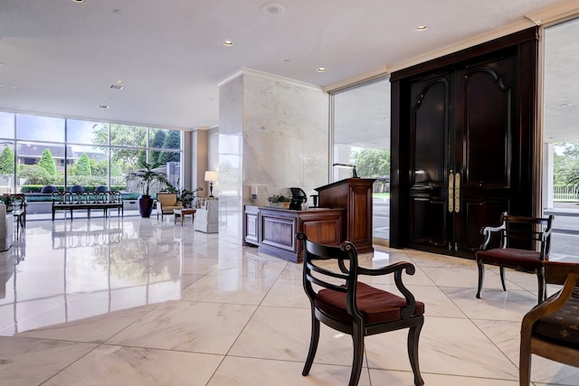 2200 Willowick Rd Unit 7B, Houston, TX 77027 - building lobby with expansive windows and recessed lighting