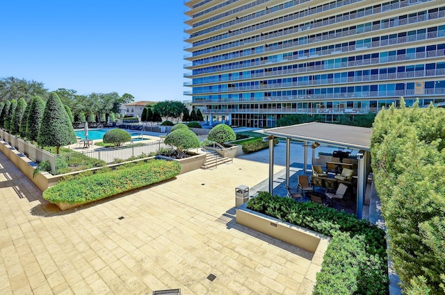 2200 Willowick Rd Unit 7B, Houston, TX 77027 - community pool with a patio