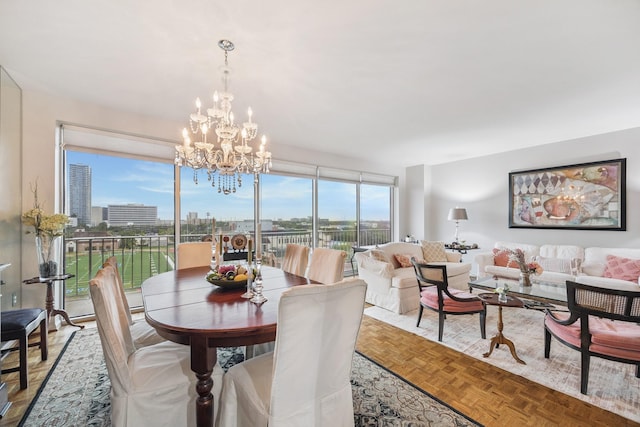 2200 Willowick Rd Unit 7B, Houston, TX 77027 - dining space featuring a chandelier and a view of city