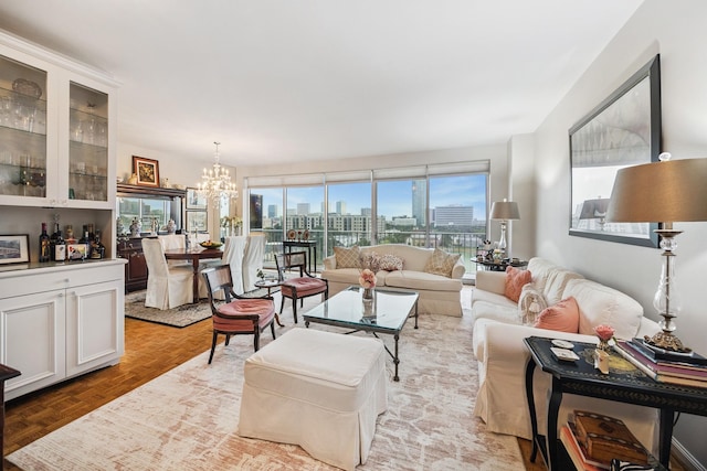 2200 Willowick Rd Unit 7B, Houston, TX 77027 - living area with a chandelier and a view of skyline