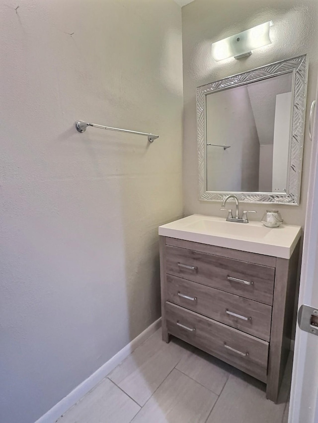 8101 Amelia Rd Unit 407D, Houston, TX 77055 - bathroom featuring tile patterned floors and vanity