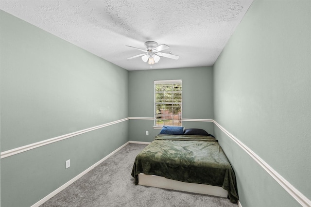 21519 San Marino Dr, Katy, TX 77450 - carpeted bedroom featuring a ceiling fan and a textured ceiling
