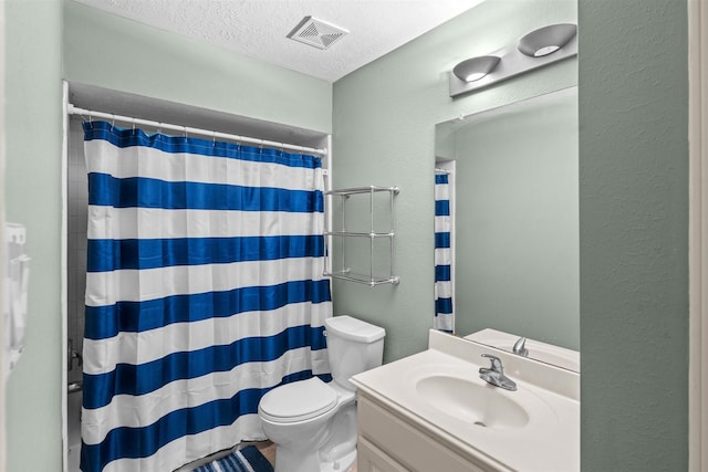 21519 San Marino Dr, Katy, TX 77450 - full bath with vanity, a textured ceiling, curtained shower, and a textured wall