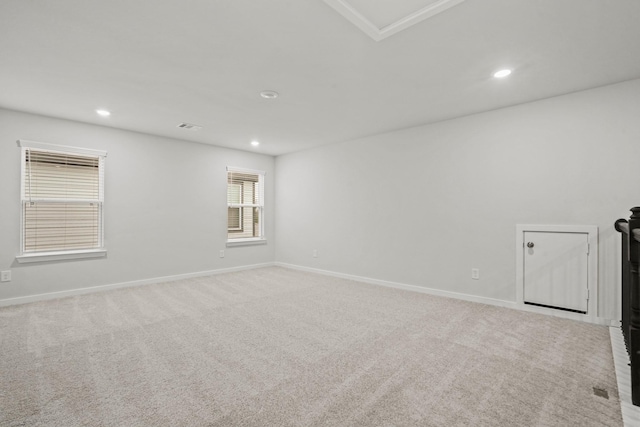 25011 Pomegranate Pl, Montgomery, TX 77316 - empty room featuring recessed lighting, light carpet, and attic access