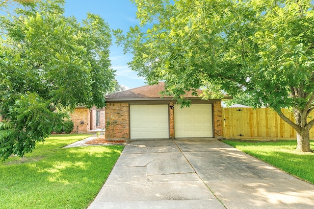 2910 Castle Ct, Pearland, TX 77581 - view of front of home with brick siding, driveway, and a garage