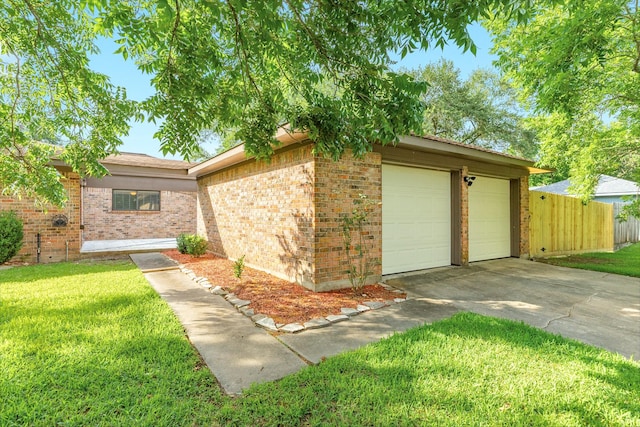 2910 Castle Ct, Pearland, TX 77581 - view of front facade with brick siding, a garage, and concrete driveway