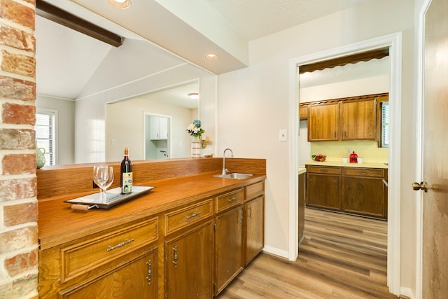 2910 Castle Ct, Pearland, TX 77581 - bar featuring a sink and light wood finished floors