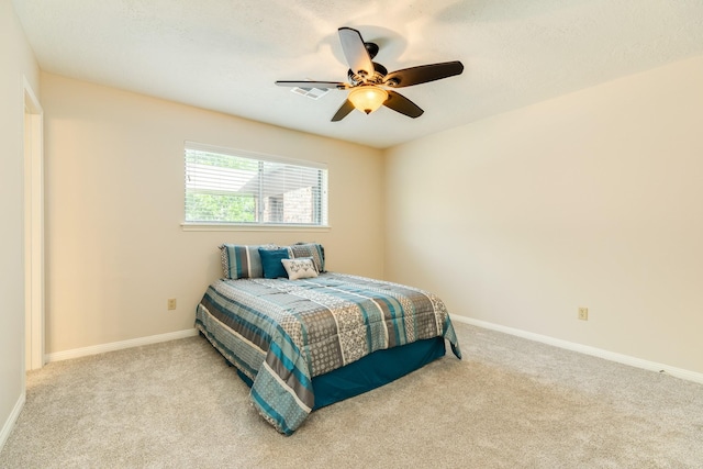 2910 Castle Ct, Pearland, TX 77581 - bedroom with carpet and a ceiling fan