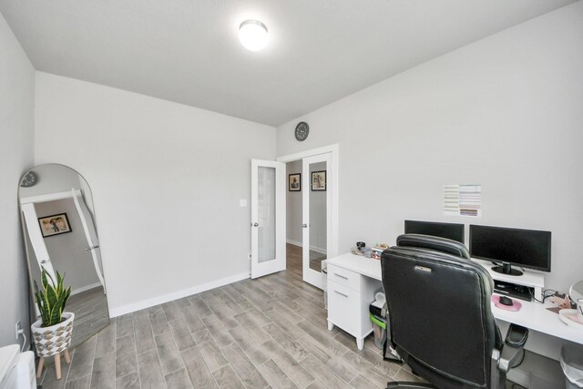 3334 Fogmist Dr, Rosenberg, TX 77471 - office with light wood-style flooring and french doors