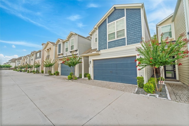 1510 Upland Glen Way, Houston, TX 77043 - view of front of home featuring a garage, a residential view, and driveway