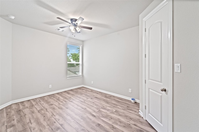 1510 Upland Glen Way, Houston, TX 77043 - spare room featuring ceiling fan, light wood-style flooring, and a smoke detector