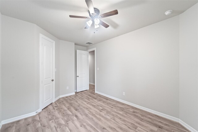 1510 Upland Glen Way, Houston, TX 77043 - unfurnished bedroom featuring light wood-style flooring and ceiling fan