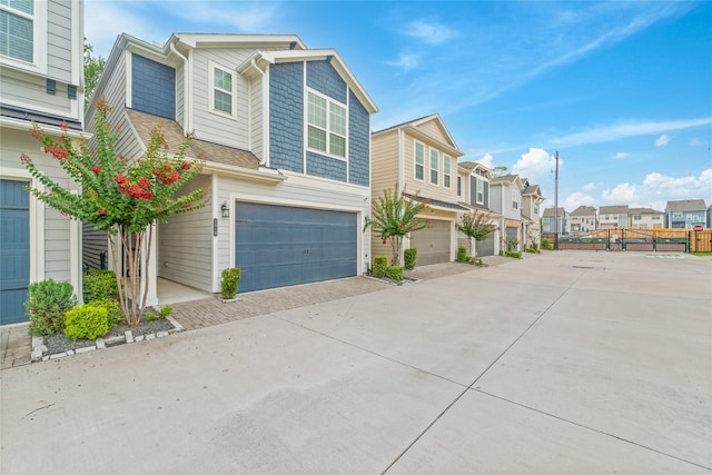 1510 Upland Glen Way, Houston, TX 77043 - view of concrete driveway featuring a residential view