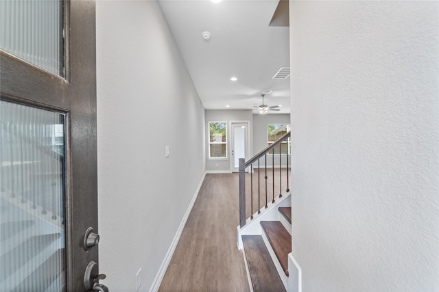 1510 Upland Glen Way, Houston, TX 77043 - entrance foyer with wood finished floors, recessed lighting, stairway, and a ceiling fan