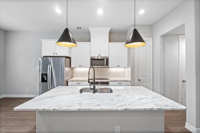 1510 Upland Glen Way, Houston, TX 77043 - kitchen featuring appliances with stainless steel finishes, white cabinetry, dark wood-style floors, decorative backsplash, and recessed lighting