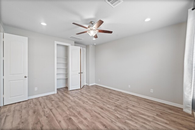 1510 Upland Glen Way, Houston, TX 77043 - unfurnished bedroom with wood finished floors, recessed lighting, ceiling fan, and a closet