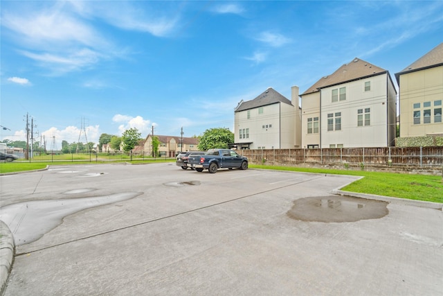 1510 Upland Glen Way, Houston, TX 77043 - uncovered parking lot with a residential view