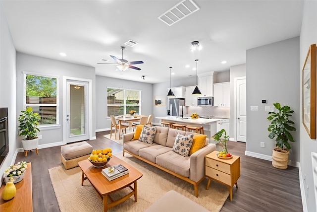 1510 Upland Glen Way, Houston, TX 77043 - living room featuring dark wood finished floors, recessed lighting, and ceiling fan