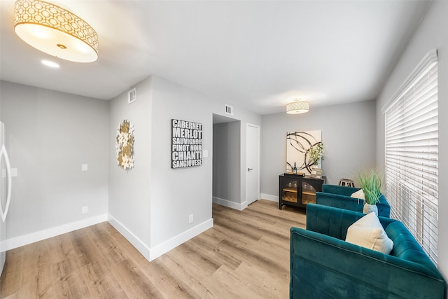 10370 Longmont Dr, Houston, TX 77042 - sitting room featuring light wood-type flooring and baseboards