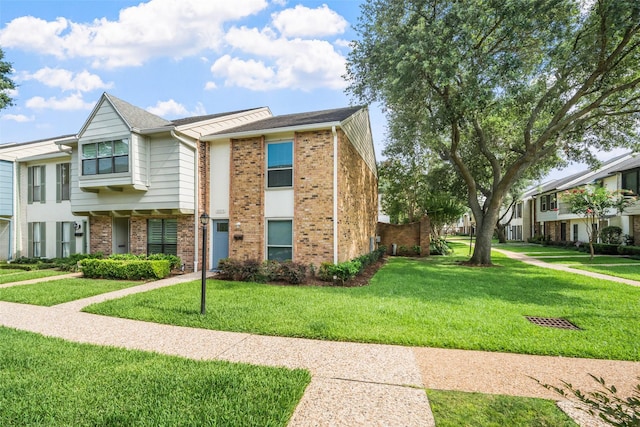 10370 Longmont Dr, Houston, TX 77042 - multi unit property featuring brick siding and a front yard