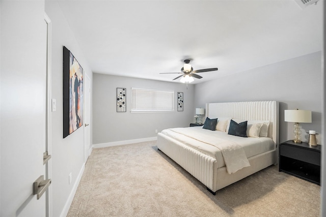 10370 Longmont Dr, Houston, TX 77042 - bedroom featuring light colored carpet and a ceiling fan