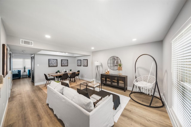 10370 Longmont Dr, Houston, TX 77042 - living area featuring light wood-style flooring and recessed lighting