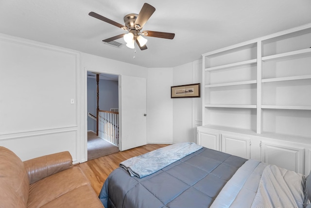 8023 Pine Falls Dr, Houston, TX 77095 - bedroom featuring wood finished floors and a ceiling fan
