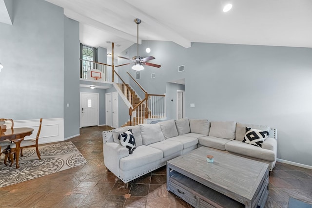 8023 Pine Falls Dr, Houston, TX 77095 - living room featuring stone tile flooring, stairway, high vaulted ceiling, beam ceiling, and plenty of natural light