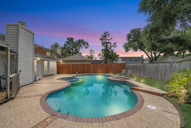 8023 Pine Falls Dr, Houston, TX 77095 - view of swimming pool featuring a patio area, a fenced backyard, and a pool with connected hot tub