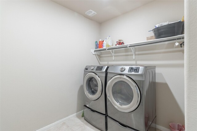 9418 Mcdowell Dr, Richmond, TX 77469 - laundry room with independent washer and dryer and baseboards