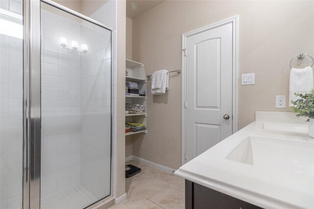 9418 Mcdowell Dr, Richmond, TX 77469 - full bath with a shower stall, double vanity, and tile patterned flooring