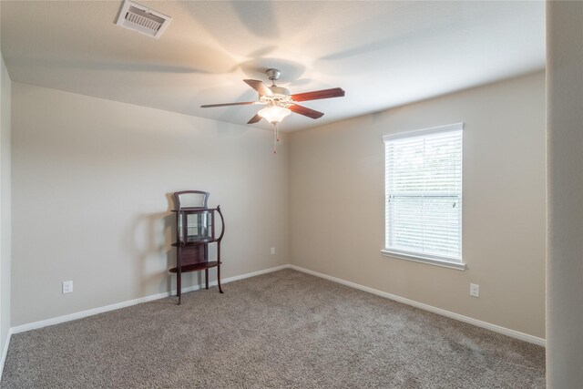 9418 Mcdowell Dr, Richmond, TX 77469 - carpeted spare room with ceiling fan and baseboards