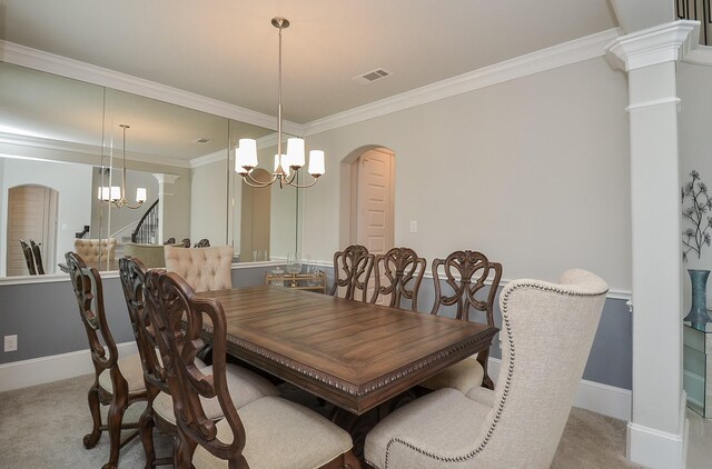 8703 Silver Crest Ln, Missouri City, TX 77459 - dining room with light colored carpet, arched walkways, crown molding, a chandelier, and ornate columns