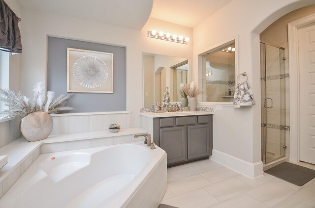 8703 Silver Crest Ln, Missouri City, TX 77459 - full bath with a garden tub, vanity, a stall shower, and tile patterned floors