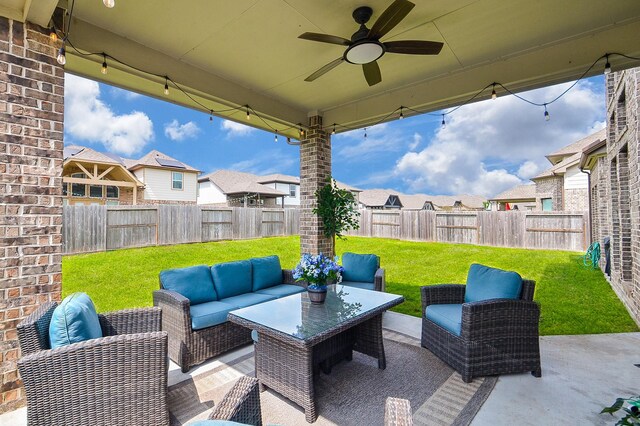 8703 Silver Crest Ln, Missouri City, TX 77459 - fenced backyard with outdoor lounge area, a residential view, a patio area, and a ceiling fan