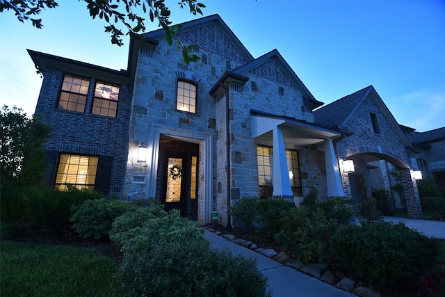 8703 Silver Crest Ln, Missouri City, TX 77459 - french country inspired facade with stone siding