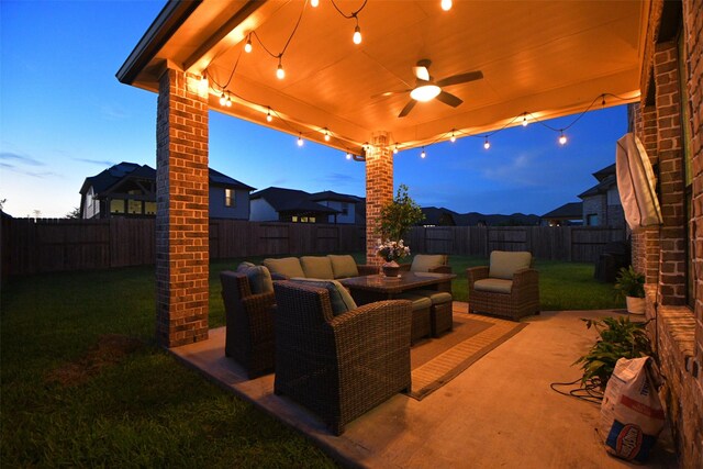 8703 Silver Crest Ln, Missouri City, TX 77459 - fenced backyard featuring a patio, ceiling fan, and an outdoor living space