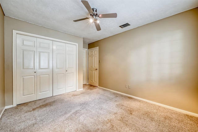 5007 Maple Brook Ln, Kingwood, TX 77345 - unfurnished bedroom featuring carpet floors, a closet, and ceiling fan