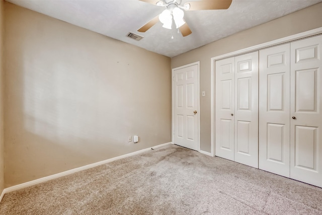 5007 Maple Brook Ln, Kingwood, TX 77345 - unfurnished bedroom featuring carpet, a closet, and ceiling fan