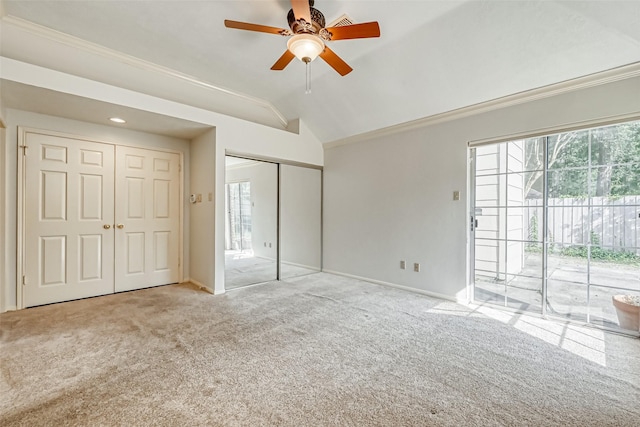 5007 Maple Brook Ln, Kingwood, TX 77345 - unfurnished bedroom featuring access to outside, carpet floors, ornamental molding, vaulted ceiling, and a ceiling fan